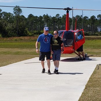 Panhandle Helicopter - Me and my brother-in-law after our flight. - Aerial Tours Near Me - Panama City Beach, Florida
