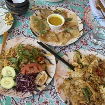 Thai Table  - Tom Kha Soup (Top), Roti(Center), Spicy Basil Fried Rice (Bottom Left), Pad Kee Mao (Bottom Right) - Thai Near Me - Berkeley, California