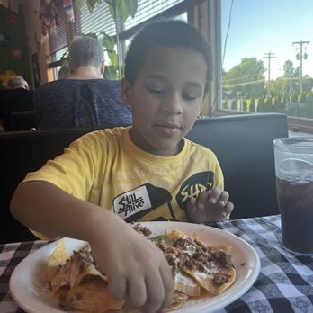 El Mezquite De Luna - My son enjoying his favorite meal. Nachos with beef. - Mexican Near Me - Fulton, New York El Mezquite De Luna - My son enjoying his favorite meal. Nachos with beef. - Mexican Near Me - Fulton, New York