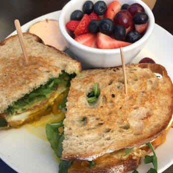 Yellow Belly - Egg sandwich. Eggs come over-medium. Fruit, salad, or potatoes were the options for the side. - American Near Me - Santa Barbara, California Yellow Belly - Egg sandwich. Eggs come over-medium. Fruit, salad, or potatoes were the options for the side. - American Near Me - Santa Barbara, California