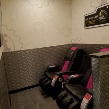 Planet Fitness - Massage chairs. Only two but this time, they are in front of a television. - Trainers Near Me - Melbourne, Florida