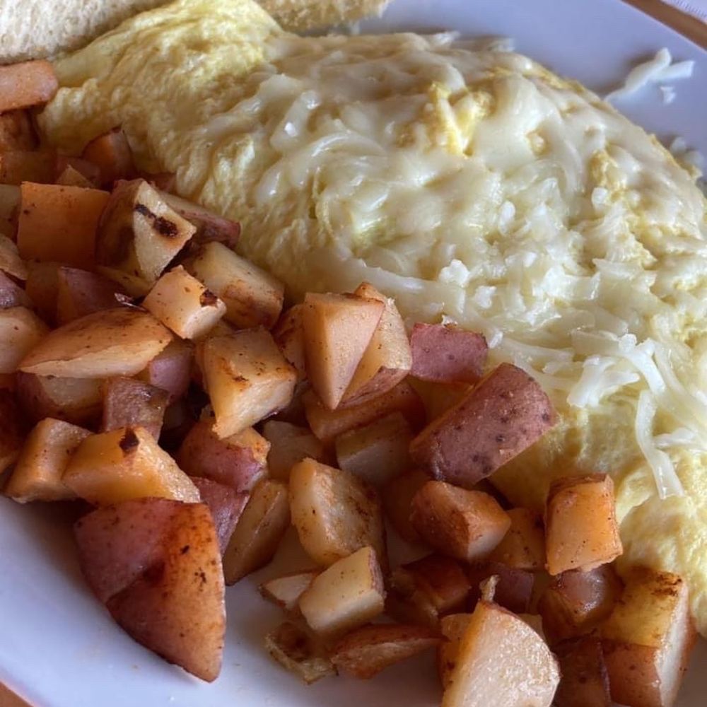 Veggie Omelette with potatoes in Breakfast menu Veggie Omelette with potatoes in Breakfast menu