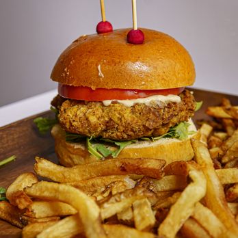 Saya Salteña - a chicken burger and french fries - Latin American Near Me - Washington, DC, District of Columbia