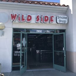 Exterior outside entrance of Wild Side Smoke Shop - Holly came from Miami, F.L.A. Hitch-hiked her way across the U.S.A... - Ventura, California Exterior outside entrance of Wild Side Smoke Shop - Holly came from Miami, F.L.A. Hitch-hiked her way across the U.S.A... - Ventura, California