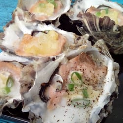 Freycinet Marine Farm - Oysters with salmon, brie, ginger and shallots. I added black pepper to the closes oyster.