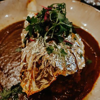 Saffron Modern Indian Dining - 24 carat Lamb Shank - Indian Near Me - Milwaukee, Wisconsin Saffron Modern Indian Dining - 24 carat Lamb Shank - Indian Near Me - Milwaukee, Wisconsin