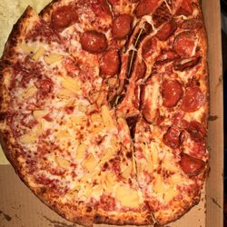 Magic Mike's Pizza Express - Pizza arrived poorly handled and carelessly boxed.