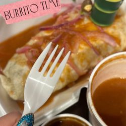 El Vaquerito Restaurant - Asada (beef) Ahogado (Wet) burrito.