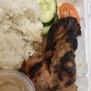Pho So 1 - Vietnamese grilled pork chop (#54) with fragrant rice, fresh tomato and cucumbers, picked cabbage, and fish sauce - Vietnamese Near Me - Lake Forest, California Pho So 1 - Vietnamese grilled pork chop (#54) with fragrant rice, fresh tomato and cucumbers, picked cabbage, and fish sauce - Vietnamese Near Me - Lake Forest, California