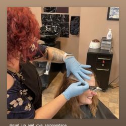 Curl Up and Dye - Our owner Vicki, applying color.