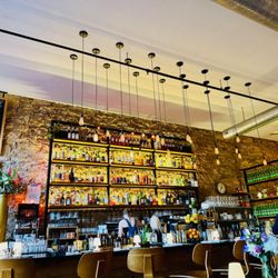 715 - Interior space is gorgeous with exposed stone and wonderful lighting