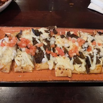 Economy Shoe Shop - Donair flatbread - Bars Near Me - Halifax, Nova Scotia Economy Shoe Shop - Donair flatbread - Bars Near Me - Halifax, Nova Scotia