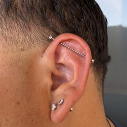 HTC Studios - Phoenix North - Industrial piercing by JD.
