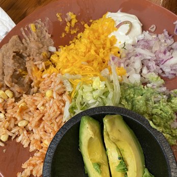 Merry Piglets Mexican Grill - Veggie Fajitas side plate with rice, beans, sour cream onions and guacamole after 1 taco was made - Mexican Near Me - Jackson, Wyoming Merry Piglets Mexican Grill - Veggie Fajitas side plate with rice, beans, sour cream onions and guacamole after 1 taco was made - Mexican Near Me - Jackson, Wyoming