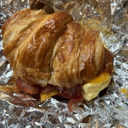 Croissant with egg bacon and cheese Croissant with egg bacon and cheese