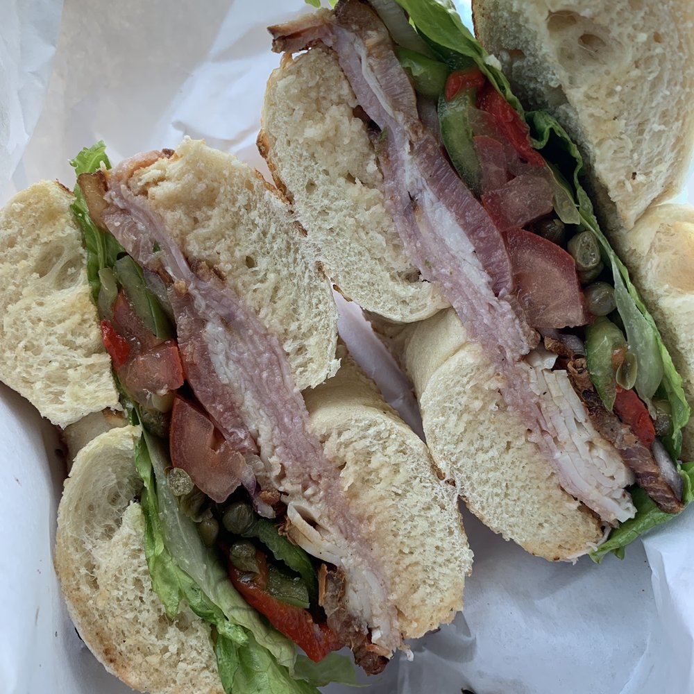Rocky Mountain Bagel Works - Club sandwich on onion bagel with extra veg - Bagels Near Me - Fort Collins, Colorado Rocky Mountain Bagel Works - Club sandwich on onion bagel with extra veg - Bagels Near Me - Fort Collins, Colorado