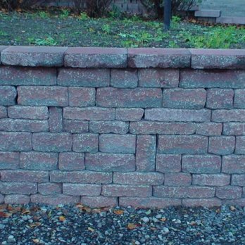 Grassmasters Landscaping - a brick retaining wall - Landscaping Near Me - Freeville, New York Grassmasters Landscaping - a brick retaining wall - Landscaping Near Me - Freeville, New York