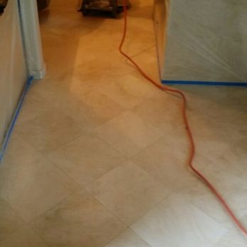 Stone Savers - Marble floor in the process of restoration. - General Contractors Near Me Stone Savers - Marble floor in the process of restoration. - General Contractors Near Me