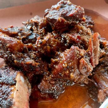 Woodpile BBQ Shack - a plate of ribs and sauce - Barbeque Near Me - Clawson, Michigan Woodpile BBQ Shack - a plate of ribs and sauce - Barbeque Near Me - Clawson, Michigan