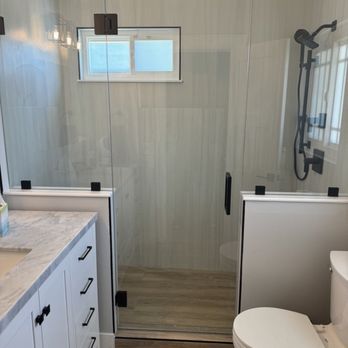 Affordable Frameless Shower Door - Shower enclosure with pony walls. - Glass & Mirrors Near Me - Laguna Niguel, California