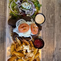Acropolis Greek Taverna - Gyro platter.  Tasty, beautiful presentation and enough for 2 to share