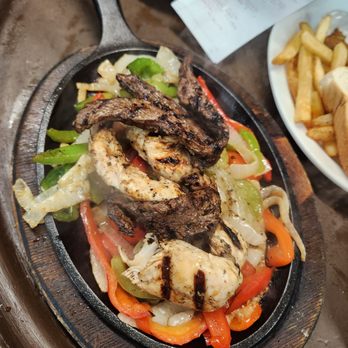50th Street Caboose - Beef and Chicken Combination Fajitas - American Near Me - Lubbock, Texas 50th Street Caboose - Beef and Chicken Combination Fajitas - American Near Me - Lubbock, Texas