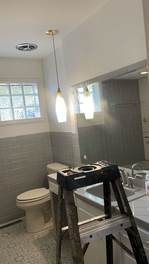 Slide of AAs Handyman