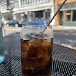 Coke in a glass that resembles a can of Coca-Cola Coke in a glass that resembles a can of Coca-Cola