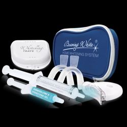 Whitening Solutions - Teeth whitening kit to maintain your bright white smile at home in between visits!