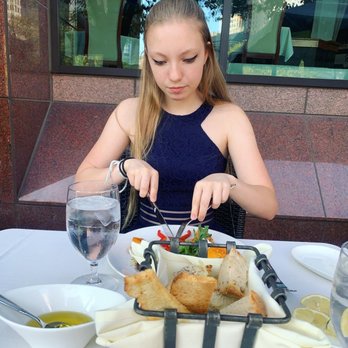 Cafe Nuovo - Ella eating her Greek salad. - New American Near Me - Providence, Rhode Island Cafe Nuovo - Ella eating her Greek salad. - New American Near Me - Providence, Rhode Island