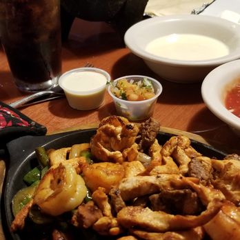 Rancho Nuevo - Awesome Fajitas with side of hot melty cheese and home-made-at-the-table guacamole! - Mexican Near Me - Front Royal, Virginia