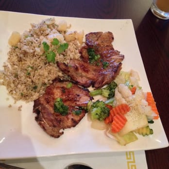 Lotus Leaf - Grilled pork chop with pineapple fried rice - Vietnamese Near Me - San Leandro, California Lotus Leaf - Grilled pork chop with pineapple fried rice - Vietnamese Near Me - San Leandro, California