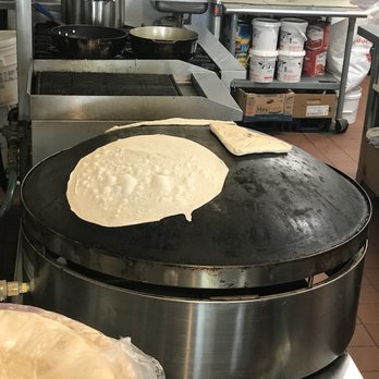 Markouk Bread - a flatbread being prepared in a commercial kitchen - Lebanese Near Me - Gloucester, Massachusetts