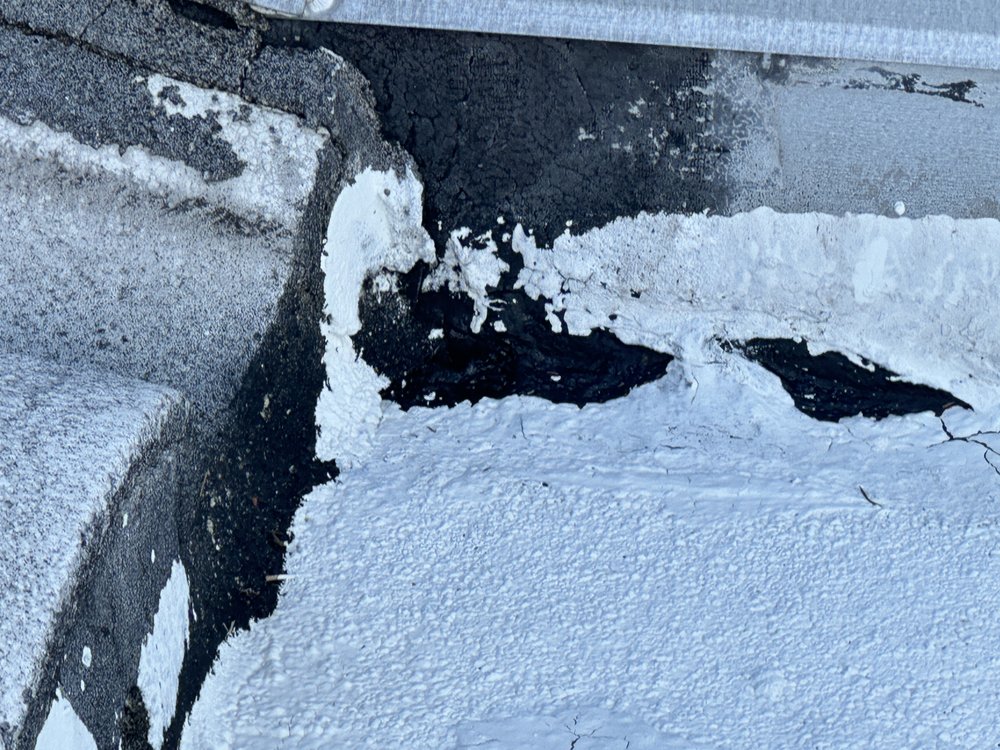 Slide of Emrd Roofing