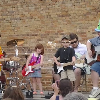 Rockys Music - Having Fun at The concert on the stage behind "Rockys Music" - Musical Instruments & Teachers Near Me - Sylvester, Georgia Rockys Music - Having Fun at The concert on the stage behind "Rockys Music" - Musical Instruments & Teachers Near Me - Sylvester, Georgia