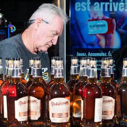 Playground - Larry Robinson dropped by to sign bottles of his signature Whiskey.