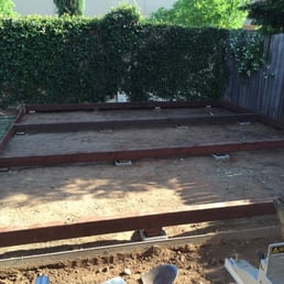 Posts and pressure treated beams down