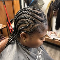 The Wig Nook - Very neat French braids.