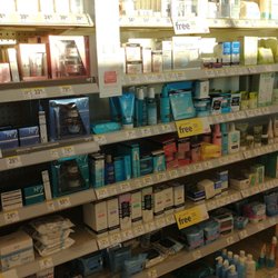 Walgreens - Give me a pair of sunglasses to see the products on the shelf, please.
