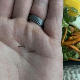 Piece of metal found in food. Piece of metal found in food.