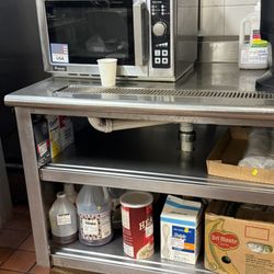 CareOne at Livingston Assisted Living - Brick holding that table up. Major OSHA violation.