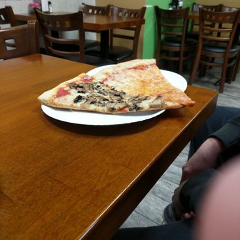 Pizza Delizia Restaurant - a slice of pizza on a plate - Pizza Near Me - Monmouth Junction, New Jersey Pizza Delizia Restaurant - a slice of pizza on a plate - Pizza Near Me - Monmouth Junction, New Jersey