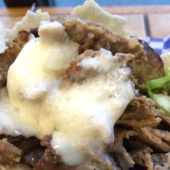 Donair Station - Dollop of garlic sauce. Looks a liitle greasy and separated. - Mediterranean Near Me - Edmonton, Alberta