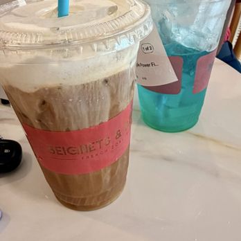 Beignets & Brew - Cold brew and Blue Razz Sour Apple Power Fizzy - Coffee & Tea Near Me - Norfolk, Virginia Beignets & Brew - Cold brew and Blue Razz Sour Apple Power Fizzy - Coffee & Tea Near Me - Norfolk, Virginia