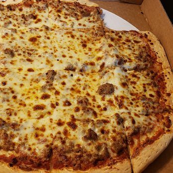 Avanti's Italian Restaurant - Large sausage pizza minus the 2 little pieces that I couldn't wait to eat! - Italian Near Me - Normal, Illinois