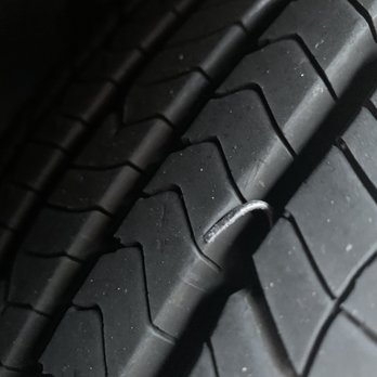 Tire Kingdom - Notice the nail is only puncturing the tire once. The other end is sticking out. Easily repaired - Tires Near Me - Orlando, Florida