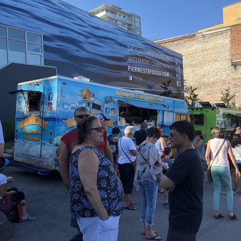 Thai Box on Truck - a group of people standing in line - Thai Near Me - Vancouver, British Columbia Thai Box on Truck - a group of people standing in line - Thai Near Me - Vancouver, British Columbia