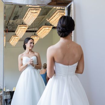 CRC Bridal Beauty - Dark brunette low bun style - Hair Stylists Near Me CRC Bridal Beauty - Dark brunette low bun style - Hair Stylists Near Me