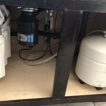 SVV Construction - Under the kitchen sink, after Viktor repaired the cabinet bottom - Handyman Near Me SVV Construction - Under the kitchen sink, after Viktor repaired the cabinet bottom - Handyman Near Me