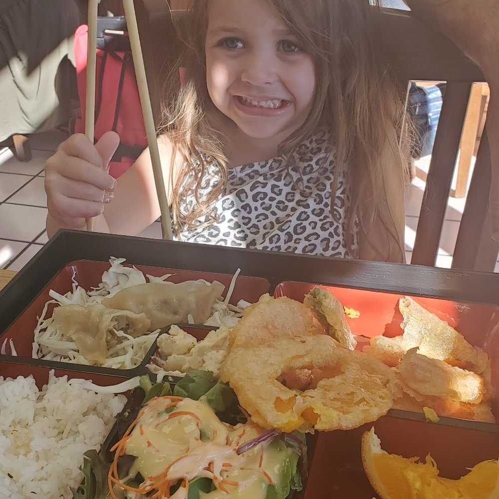 Hayashi Sushi - My daughter enjoying her bento box. - Sushi Bars Near Me - Half Moon Bay, California Hayashi Sushi - My daughter enjoying her bento box. - Sushi Bars Near Me - Half Moon Bay, California